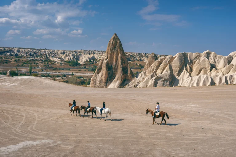tourists-enjoy-ride-horses-cappadocia-turkey (1)
